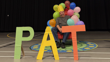Pat crossing guard at ASIA North Poplar is celebrated