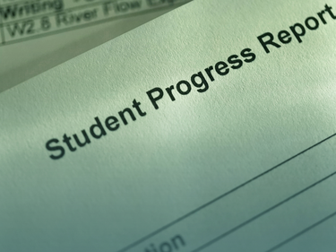 Close-up of a student progress report document showing the heading “Student Progress Report,” representing student learning updates shared with families.