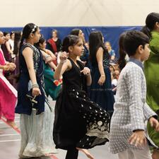 Elementary students performing a Bhangra dance for their school